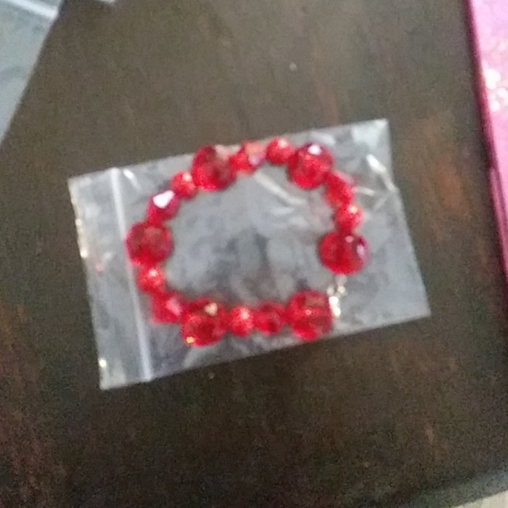 Hand made red bead bracelet